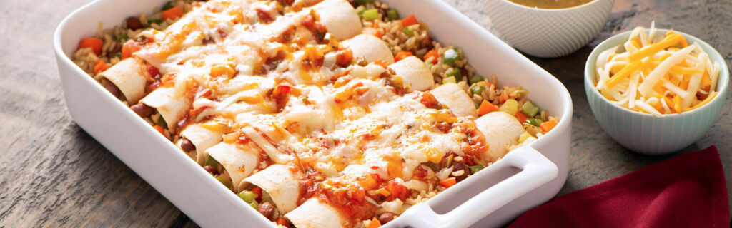 Baked enchiladas with brown rice and cheese