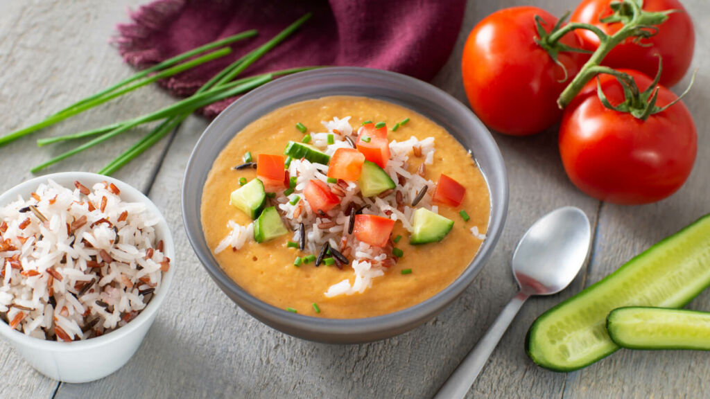 Gazpacho bowl topped with vegetables and rice