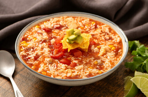 Bowl with Mexican rice soup and southwest chicken