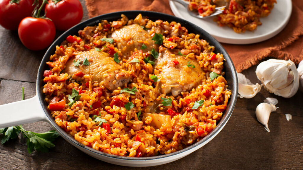 Paella with bacon, kimchi and chicken thighs