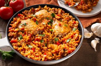 Paella with bacon, kimchi and chicken thighs