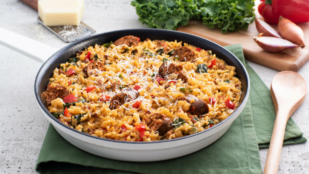 Bowl with baked jambalaya risotto and kale