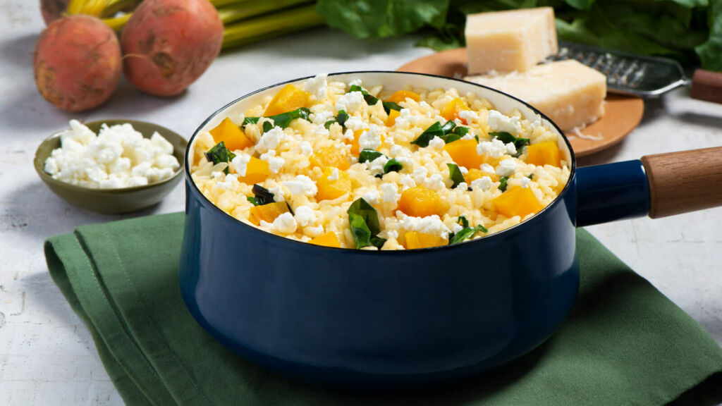 Creamy risotto with beets, greens and goat cheese