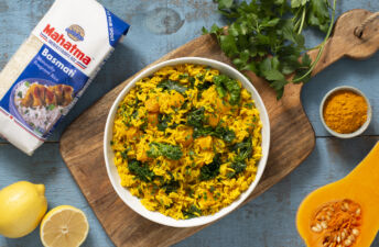 Turmeric yellow rice with butternut squash and kale