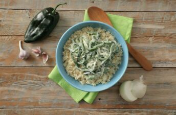 creamy-rice-with-poblano-strips-garlic-onion-mexican-cream-and-parboiled-rice