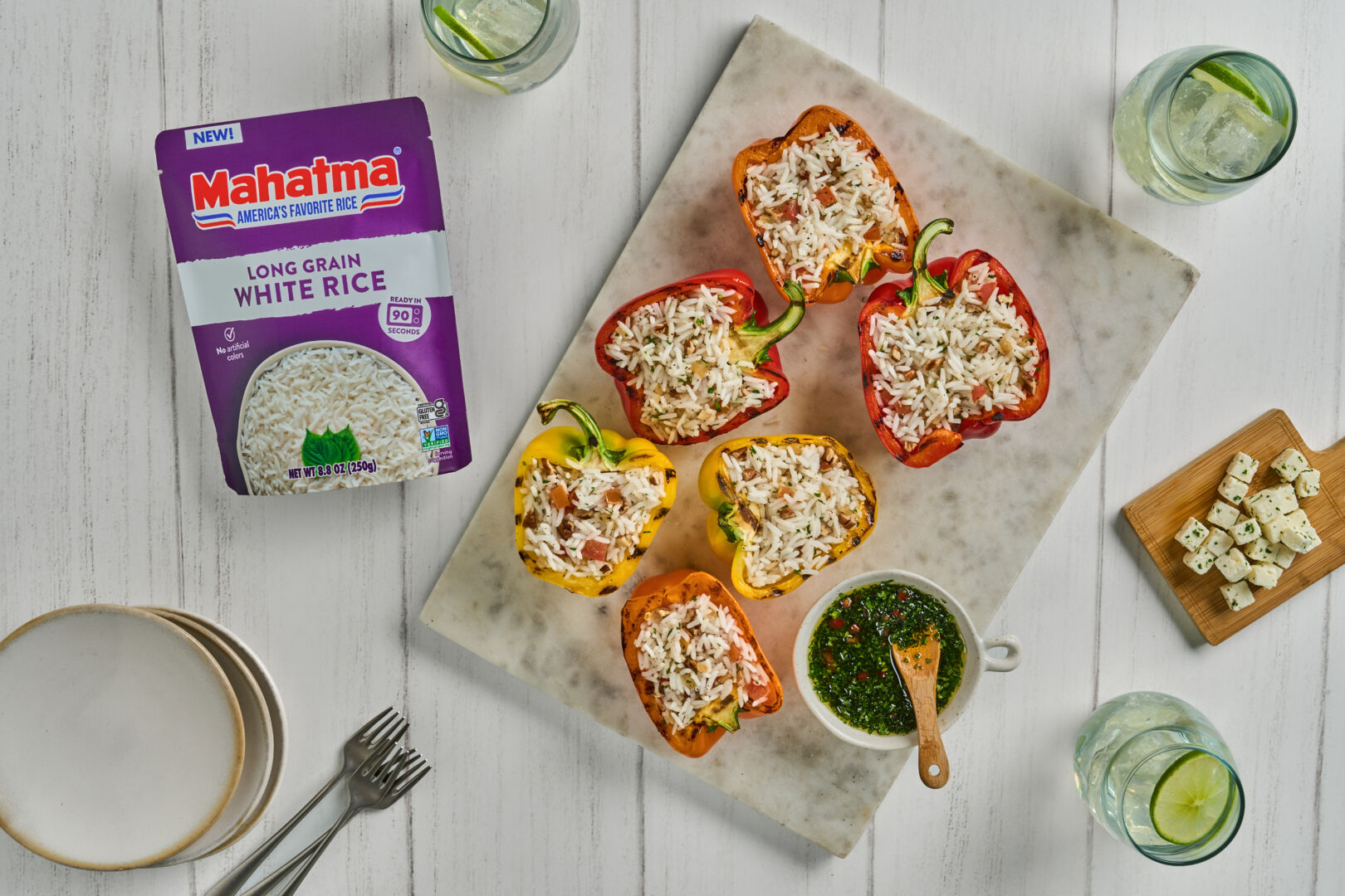 Rice-Stuffed Bell Peppers with Feta, Herbs and Tomato Sauce